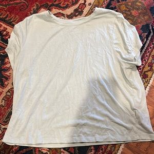 A sea green sort of cropped shirt!